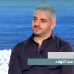 Dr. Joseph Gharios discussing proctology conditions in a television interview